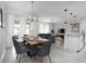 Open concept dining room flows into the kitchen and living room at 4241 Paragraph Dr, Kissimmee, FL 34746