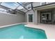 Inviting private pool with covered patio area at 4241 Paragraph Dr, Kissimmee, FL 34746