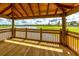 Wooden gazebo overlooking a pond, offering a tranquil setting at 4241 Paragraph Dr, Kissimmee, FL 34746