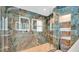 Spa-like bathroom with walk-in shower and marble tile at 45 Sackett Rd, Debary, FL 32713