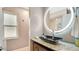 Modern bathroom with a unique vessel sink and LED mirror at 45 Sackett Rd, Debary, FL 32713