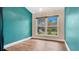Charming bedroom with large windows and wood floors at 45 Sackett Rd, Debary, FL 32713