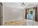 Bright dining room with large windows and tile floors at 45 Sackett Rd, Debary, FL 32713