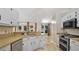 Modern kitchen with stainless steel appliances and ample counter space at 45 Sackett Rd, Debary, FL 32713