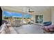 Relaxing screened patio with seating area and outdoor grill at 45 Sackett Rd, Debary, FL 32713
