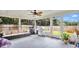 Spacious screened porch offers ample seating and backyard views at 45 Sackett Rd, Debary, FL 32713