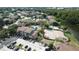 Condominium community with pool, tennis courts, and lake view at 4601 Cason Cove Dr # 214, Orlando, FL 32811
