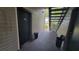 Building hallway with access to condo units at 4601 Cason Cove Dr # 214, Orlando, FL 32811