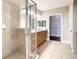 Main bathroom with double vanity and large shower at 513 Mirasol Cir # 101, Celebration, FL 34747