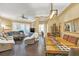 Open dining area with a rustic farmhouse table and hardwood floors at 513 Mirasol Cir # 101, Celebration, FL 34747