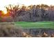 Scenic golf course with water feature at sunset at 513 Mirasol Cir # 101, Celebration, FL 34747