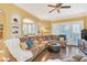 Spacious living room with hardwood floors and comfortable seating at 513 Mirasol Cir # 101, Celebration, FL 34747