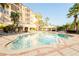 Inviting resort-style pool with surrounding lounge chairs at 513 Mirasol Cir # 101, Celebration, FL 34747