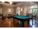 Recreation room with pool table and comfortable seating at 513 Mirasol Cir # 101, Celebration, FL 34747