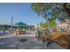 Seating area overlooking lake, with electric scooters at 513 Mirasol Cir # 101, Celebration, FL 34747