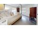 Main bedroom with canopy bed and wooden dresser at 6353 River Rd, New Smyrna Beach, FL 32169