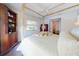 Main bedroom with canopy bed and built-in shelving at 6353 River Rd, New Smyrna Beach, FL 32169