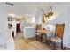 Bright kitchen with white cabinets, speckle countertops, and stainless steel appliances at 6353 River Rd, New Smyrna Beach, FL 32169
