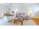 Bright and airy living room with plenty of natural light at 6353 River Rd, New Smyrna Beach, FL 32169