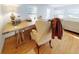 Home office with a rustic desk and comfortable chair at 6353 River Rd, New Smyrna Beach, FL 32169