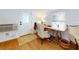 Home office with wooden desk, chair and window at 6353 River Rd, New Smyrna Beach, FL 32169