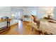Home office with a large wooden desk and comfortable seating at 6353 River Rd, New Smyrna Beach, FL 32169