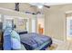 Bedroom with king-size bed and mirrored closet at 698 Roaring Dr # 382, Altamonte Springs, FL 32714