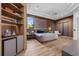 Spacious bedroom with wood floors and built-in shelving at 9343 Tibet Pointe Cir, Windermere, FL 34786