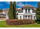 Luxury home showcasing a portion of the exterior with stone and stucco at 9343 Tibet Pointe Cir, Windermere, FL 34786