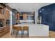 Modern kitchen with a large island, ample cabinetry, and top-of-the-line appliances at 9343 Tibet Pointe Cir, Windermere, FL 34786