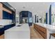Modern kitchen with a large island, ample cabinetry, and top-of-the-line appliances at 9343 Tibet Pointe Cir, Windermere, FL 34786