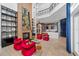 Open living room with fireplace and kitchen view at 9343 Tibet Pointe Cir, Windermere, FL 34786