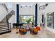 Spacious living area with large windows and water views at 9343 Tibet Pointe Cir, Windermere, FL 34786