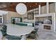 Modern outdoor kitchen with a large island and high-end appliances at 9343 Tibet Pointe Cir, Windermere, FL 34786