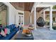 Outdoor patio with seating area, and hanging chair at 9343 Tibet Pointe Cir, Windermere, FL 34786