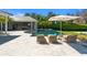 Resort-style pool with outdoor kitchen, lounge chairs, and patio at 9343 Tibet Pointe Cir, Windermere, FL 34786