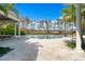 Inviting pool area with expansive lake views at 9343 Tibet Pointe Cir, Windermere, FL 34786