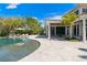 Luxury pool and expansive patio with outdoor seating at 9343 Tibet Pointe Cir, Windermere, FL 34786