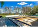 Sand volleyball court and expansive lake view at 9343 Tibet Pointe Cir, Windermere, FL 34786