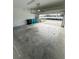 Spacious garage with concrete floor and ample storage space at 10215 Highline Crest St, Orlando, FL 32832