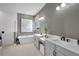 Primary bathroom with soaking tub and double vanity at 14279 Crest Palm Ave, Windermere, FL 34786