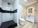 Modern bathroom with walk-in shower and floating vanity at 1625 Normandy Way, Leesburg, FL 34748