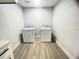 Laundry room with washer and dryer included at 1625 Normandy Way, Leesburg, FL 34748