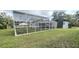 Large screened patio area adjacent to the house at 1625 Normandy Way, Leesburg, FL 34748