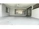 Covered patio with view of the kitchen at 1625 Normandy Way, Leesburg, FL 34748