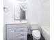 Clean bathroom with white vanity, toilet, and shower/tub combo at 2007 Dixie Belle Dr # 2007A, Orlando, FL 32812