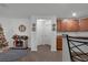 Hallway with decorative fireplace and access to other rooms at 2325 Crossandra St, Mascotte, FL 34753