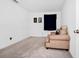 Cozy bedroom with a couch and neutral wall colors at 2362 Lancashire St, Davenport, FL 33896