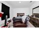 Bright bedroom with a comfy chair and ample closet space at 2362 Lancashire St, Davenport, FL 33896
