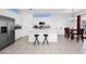 Modern kitchen with white cabinets and stainless steel appliances at 2362 Lancashire St, Davenport, FL 33896